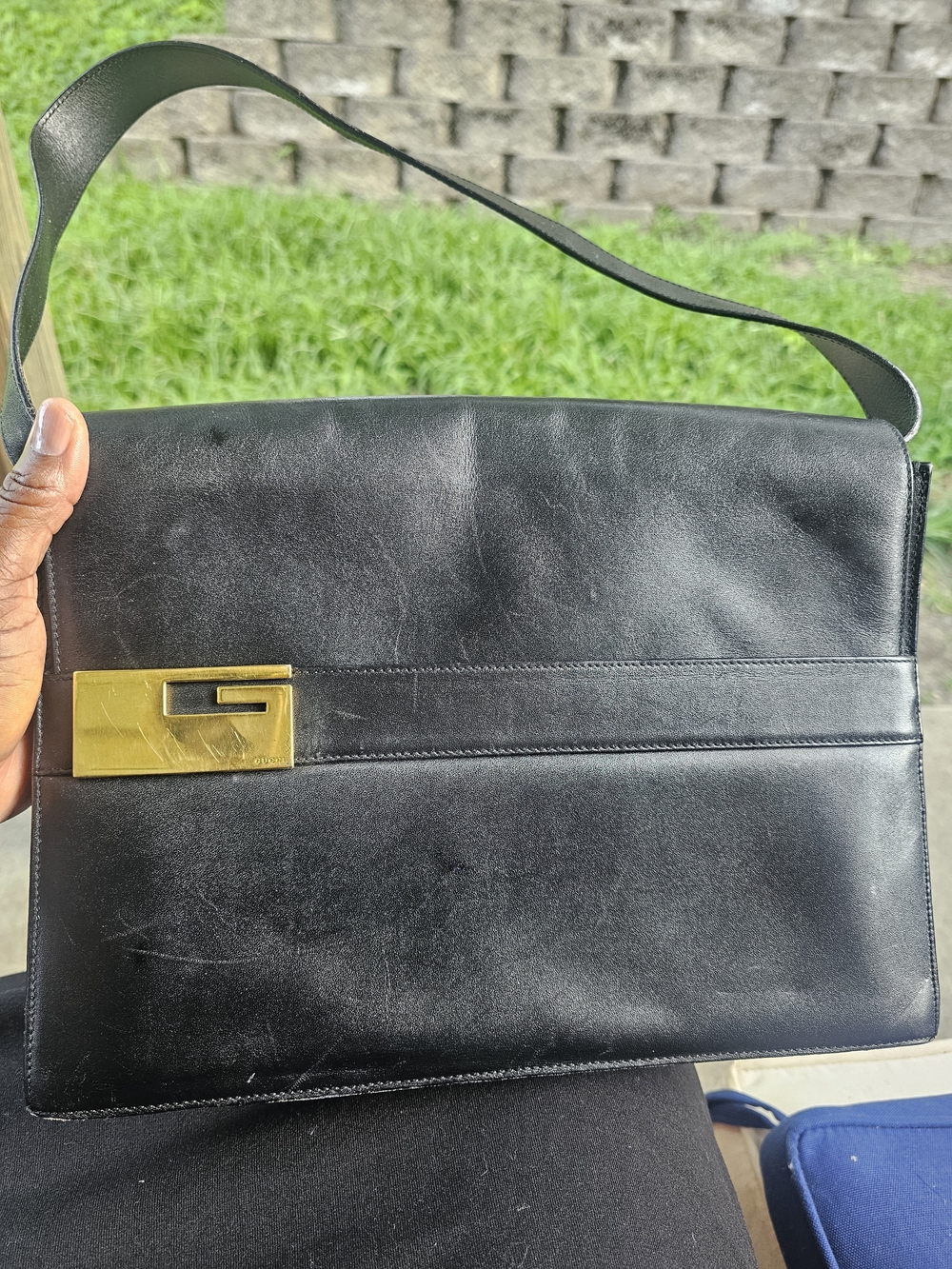 Black Leather Shoulder Bag with Gold Accent